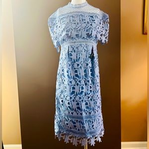 New in original package maternity crochet dress Sz 8